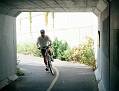 Bicyclist entering tunnel