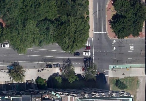 Transition from bike lane to no bike lane to bike lane at right edge. Note, no shared-lane markings yet in this aerial view (Google Maps aerial view)