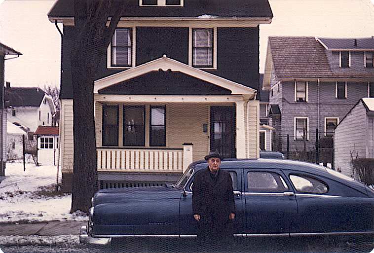 AMS and Nash in front of house.jpg (70793 bytes)