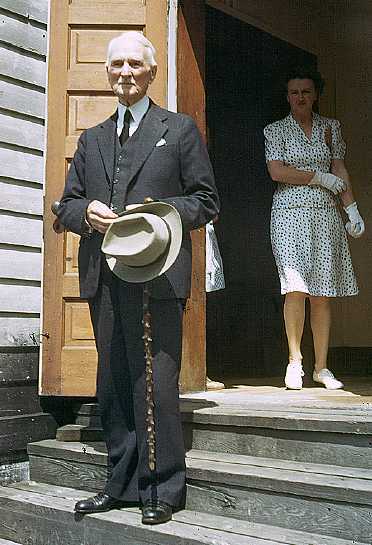 The Rev. J.W.A. Stewart on the steps of the church